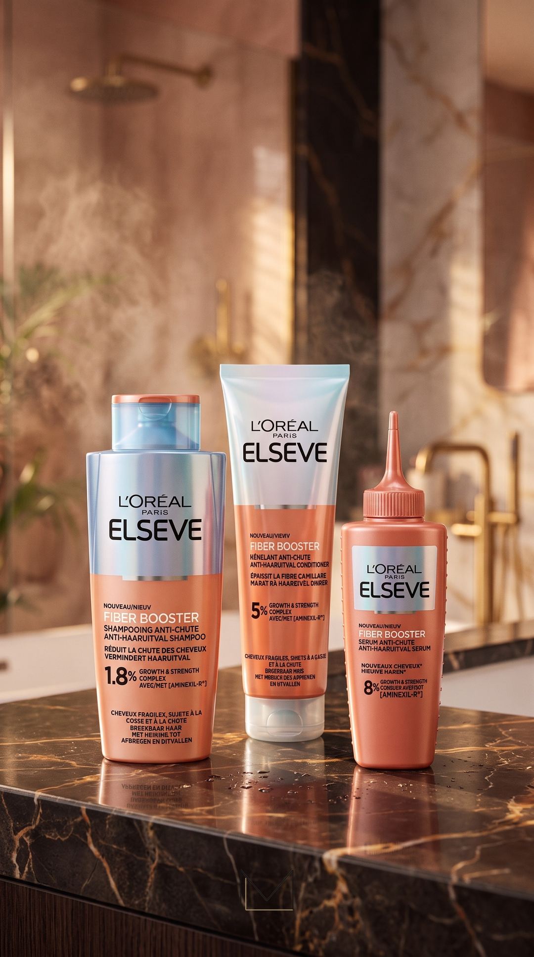 Gamme de soins capillaires présentée sur un comptoir en marbre